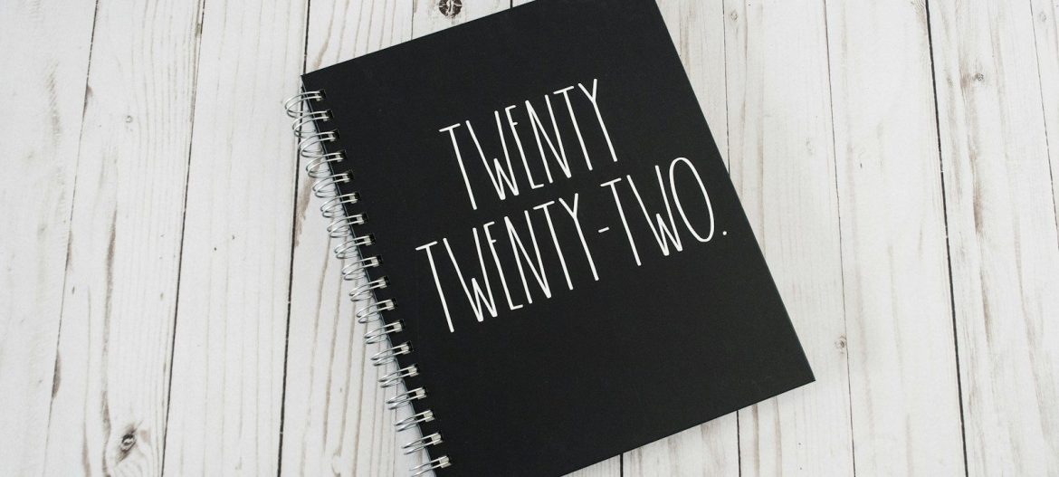 Photo by Debby Hudson a notebook with the words twenty twenty two written on it